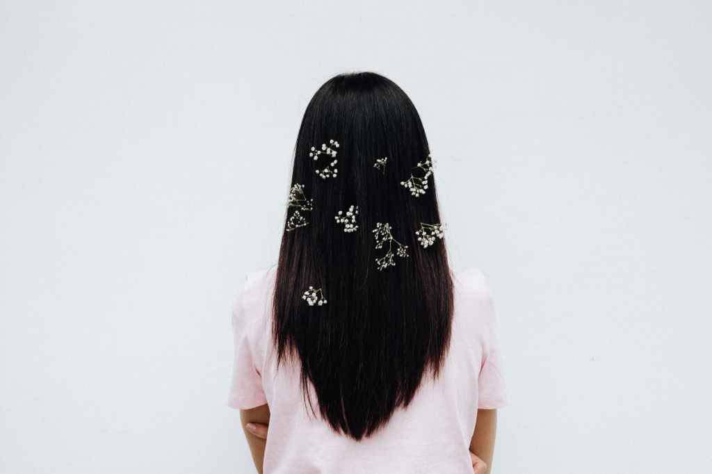 flowers on a woman s hair